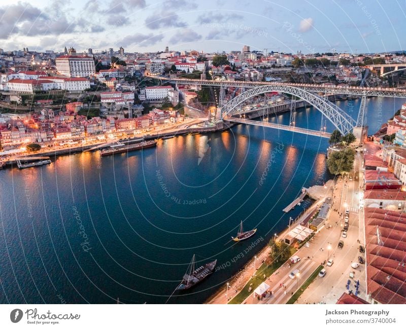 Aerial cityscape of Porto and Vila Nova da Gaia with connecting bridge, Portugal porto gaia night vila nova da gaia luis boat house portugal architecture old