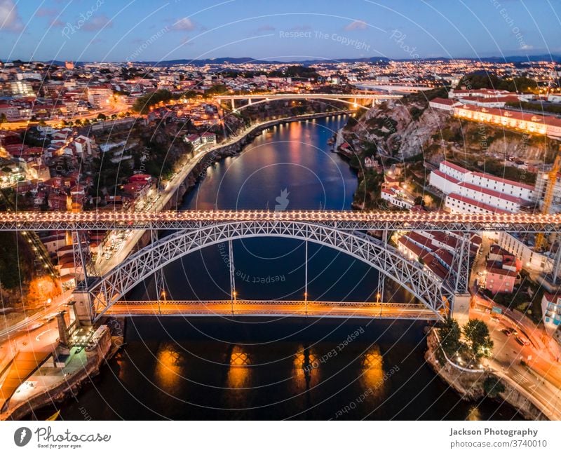 Aerial cityscape of Porto and Vila Nova da Gaia with connecting bridge, Portugal porto gaia night vila nova da gaia luis boat house portugal architecture old