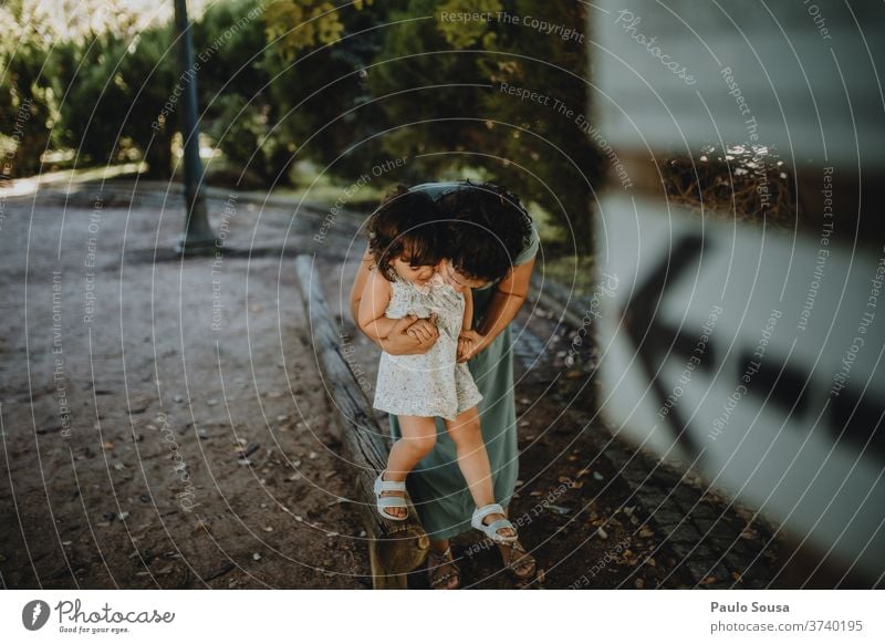 Mother kissing daughter motherhood Daughter Family & Relations Together togetherness Love Kissing Park Smiling Joy Infancy Beautiful Lifestyle Happy Caucasian