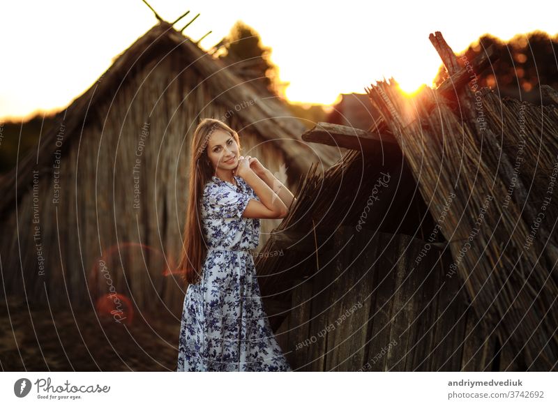 beautiful Young woman outdoors portrait. Portrait of a beautiful girl against a tree house. cute face person lifestyle summer pretty adult caucasian female