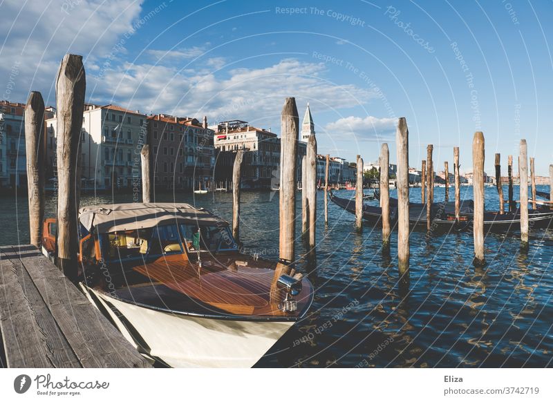 A motorboat at a pier in Venice Motorboat Channel Water Watercraft Jetty Italy Port City ship