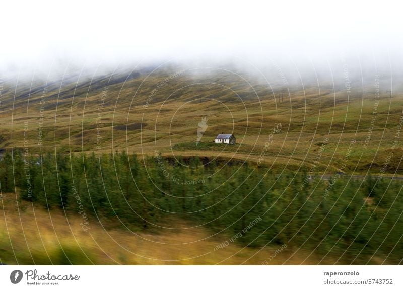 View from the moving car to a single standing homestead, Iceland road trip Belt highway Driving Trip House (Residential Structure) Individual Lonely Landscape