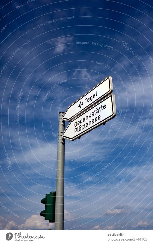 Signposts to Tegel and to Plötzensee Road marking Road sign Information Tourist Attraction Museum memorial jail sudden lake airport TXL Airport Orientation