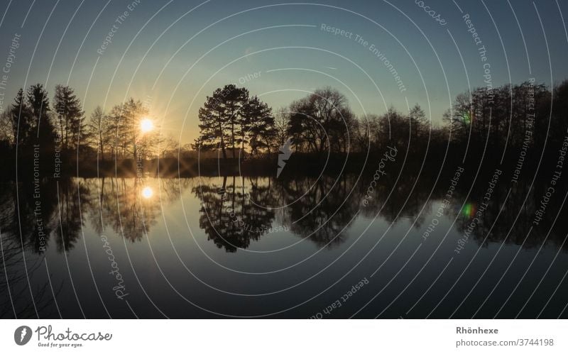 Sunset at the lake with beautiful reflections Sky Dusk Water Calm Landscape Lake Exterior shot Reflection Light already Nature Twilight Deserted Relaxation