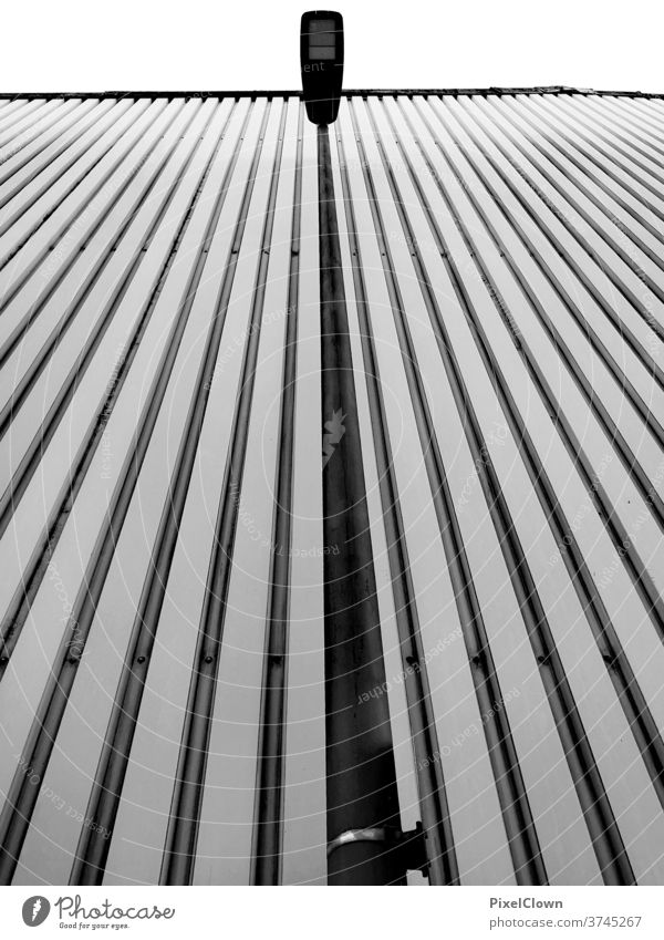 A lamp high up streetlamp Facade urban Town Sky Exterior shot built Lighting, black and white