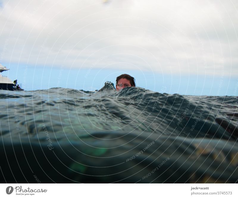 emerge from the sea Head Pacific Ocean Vacation & Travel Young woman Waves Sea water Surface of water Swimming & Bathing Front view portrait Undulation Forward