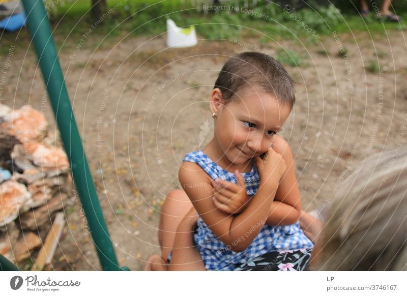 little girl holding her arms on her chest looking and smiling at an adult arms up Protection Body language Human being Emotions Communicate smile hug Gesture