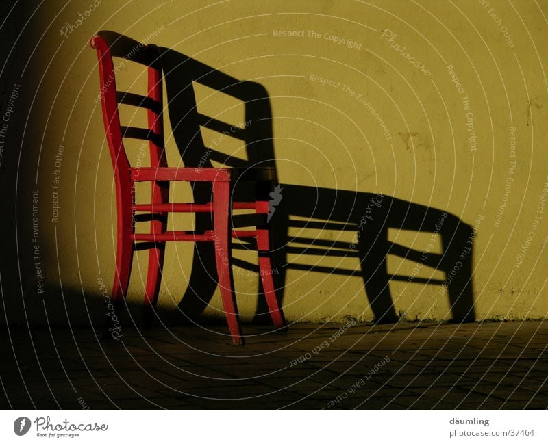 shadow cast Evening sun Furniture Calm Closing time Living or residing Chair Shadow