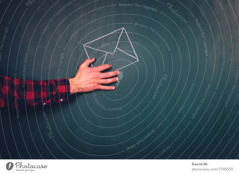 Hand holds letter Letter (Mail) choice by hand voters absentee balloting Politics and state Envelope (Mail) To hold on Communication Information Transmit