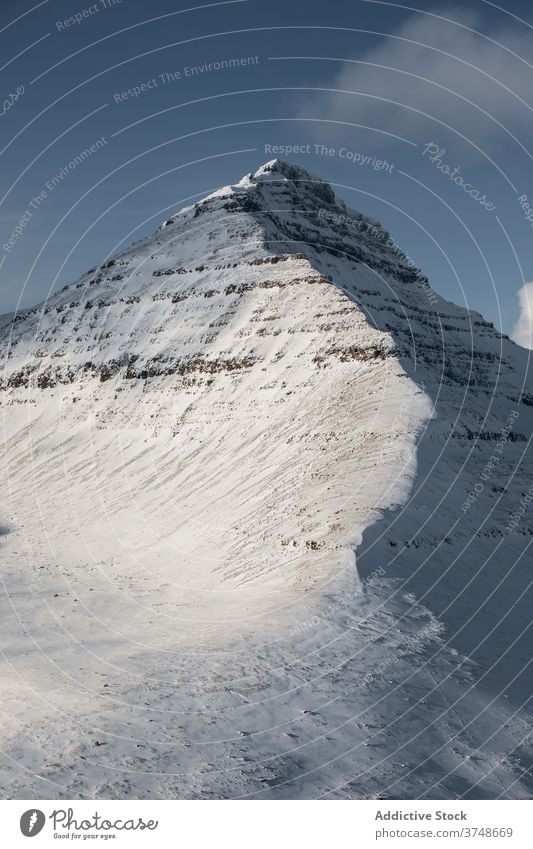 Snowy mountains on winter day snow cold nature landscape scenic sky ridge gray white weather scenery hill tranquil environment destination picturesque rock