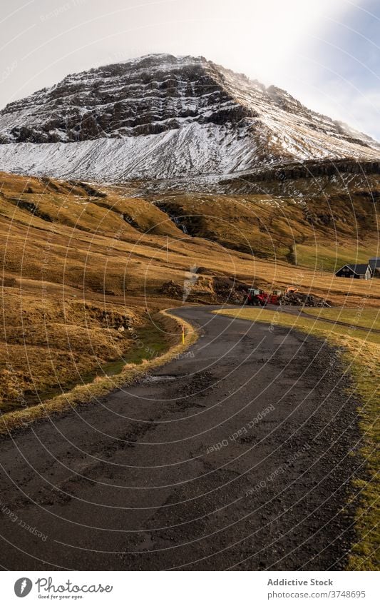 Wooden cottage on Faroe Islands on mountain village houses winter cold mountains nordic faroe islands travel coastal vacation famous place tourism