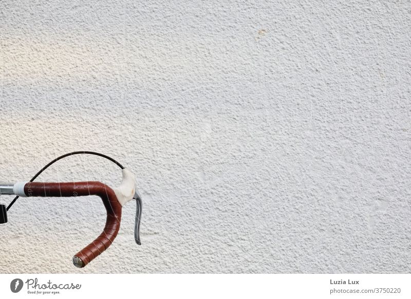 Bicycle handlebars, sporty nostalgic Lonely urban Town Handlebars Brown Athletic Exterior shot Cycling Colour photo Deserted Day Leisure and hobbies