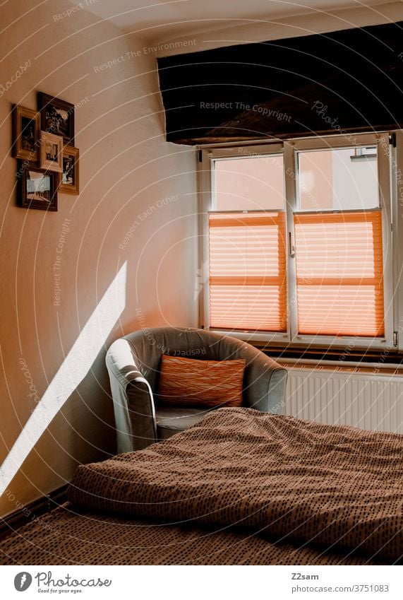 Bedroom with sunlight at home Sun Sunbeam Sunlight upholstered furniture Armchair pictures Window domestic dwell Furniture Cozy Homey