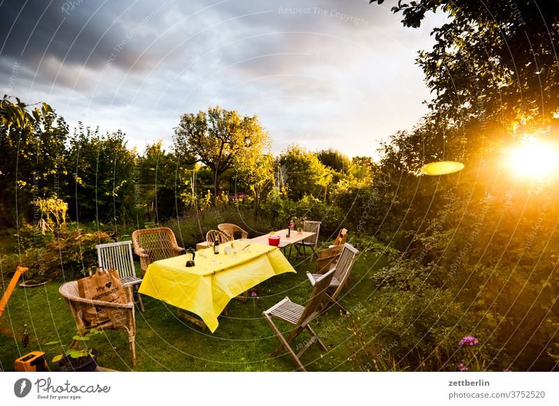 Finished garden party in the evening Evening altocumulus Menacing conceit Twilight somber colour spectrum Closing time Worm's-eye view Thunder and lightning