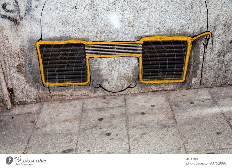 Art on building | silent observer Wall (building) Concrete Wall (barrier) Gray Vent slot Ventilation shaft Graffiti Whimsical Eyeglasses Person wearing glasses