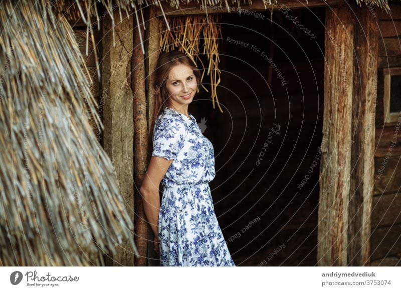 beautiful Young woman outdoors portrait. Portrait of a beautiful girl against a tree house. cute face person lifestyle summer pretty adult caucasian female