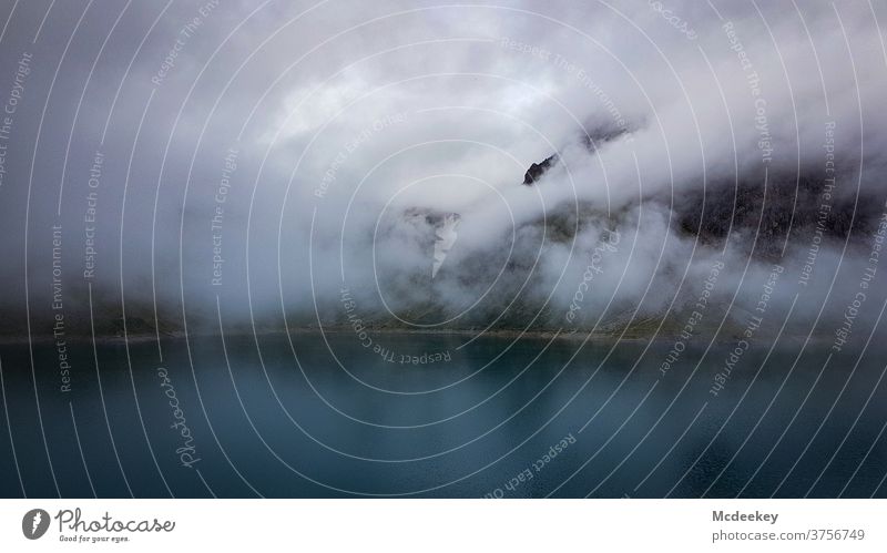 Lünersee Lake Lakeside Fog Deserted Water Autumn Shroud of fog Wall of fog Misty atmosphere Mountain mountains Alpine Alps rätikon Mystic Vacation & Travel