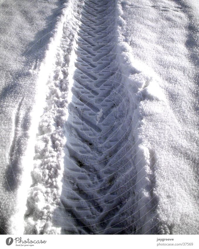 tire tracks in the snow Skid marks Winter Snow track Tracks Ice Tractor track