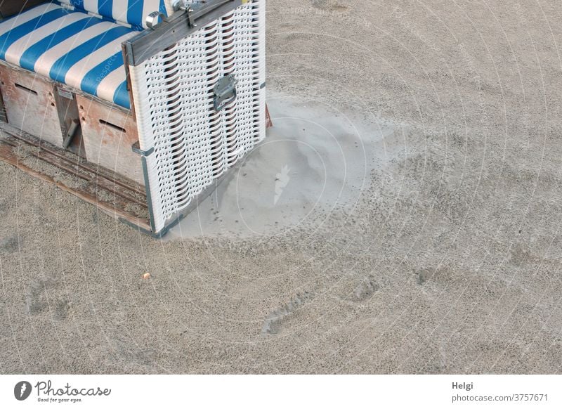 Dry zone - partial view of a beach chair in the sand after the rain, in the lee of the beach the sand is still dry Beach Sand Rain Detail Wet Island