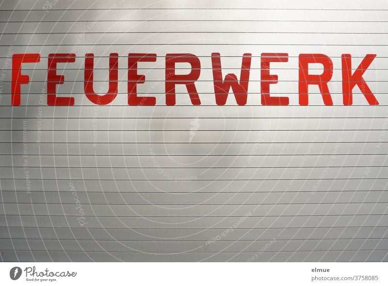 *900* I "FEUERWERK" is written in big red letters on a grey metal gate Firecracker writing Goal Signage Signs and labeling Characters Typography Compromise