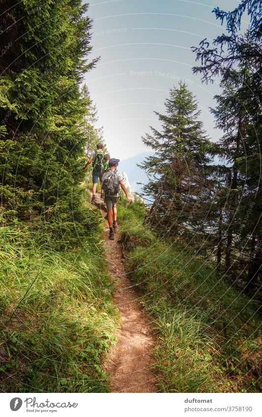 Children Hiking Path Mountaineering mountains Vacation & Travel Alps Panorama (View) hike Alpine pasture Movement Meadow Exterior shot fun Landscape Family