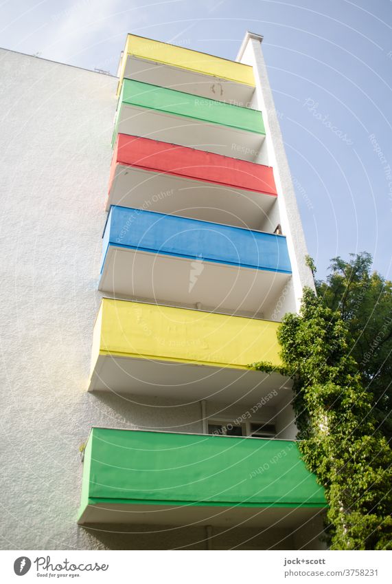 Colour green, yellow, blue, red on the balcony is beautiful in any weather Balcony Architecture Sky Facade variegated Decoration Colour scheme