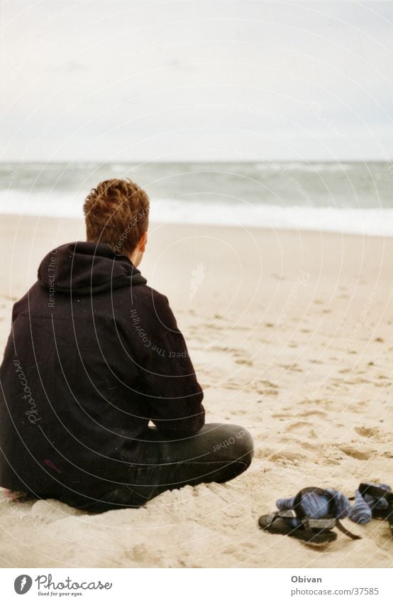 In thought Man Footwear Ocean Beach Calm Thought Waves Bad weather Far-off places