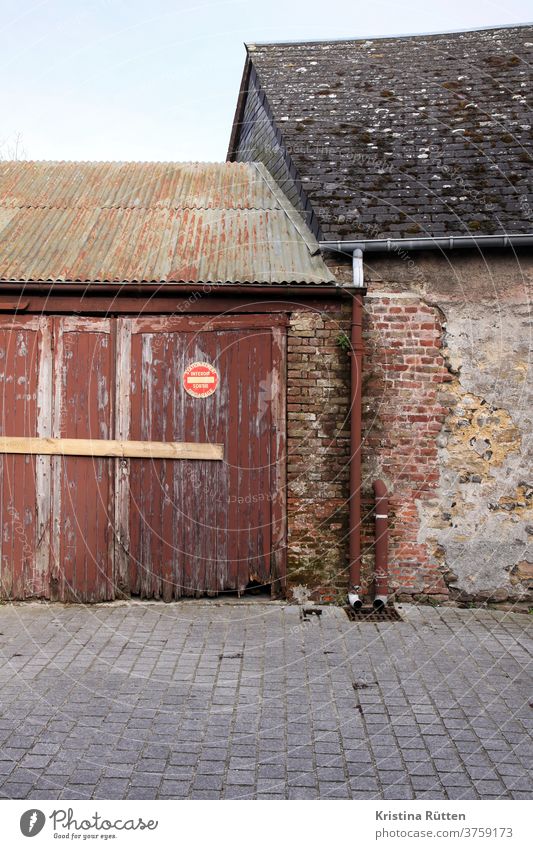 old house meets old garage with french parking forbidden sign House (Residential Structure) Barn Flake Garage Courtyard Highway ramp (entrance) access road