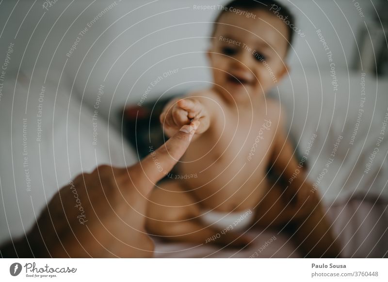 Child touching fingers with father Together togetherness Father fatherhood point of view Toddler Lifestyle Family & Relations Infancy Adults Parents dad