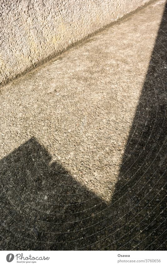 shadow Shadow Shadow play built Part of a building Wall (barrier) Wall (building) Sunlight Corner angles Gray bailer roughcast Diagonal Day