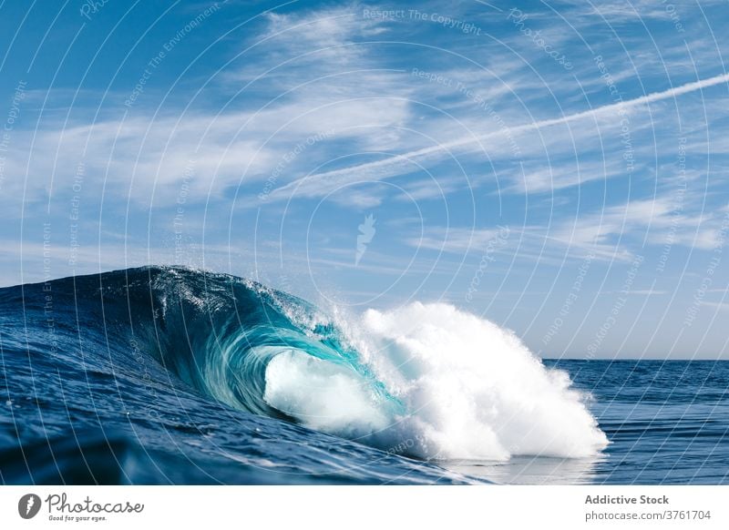 Stormy blue sea with waves ocean power water nature landscape seascape coast surf tropical crest summer splash white foam seashore surface storm wet spray