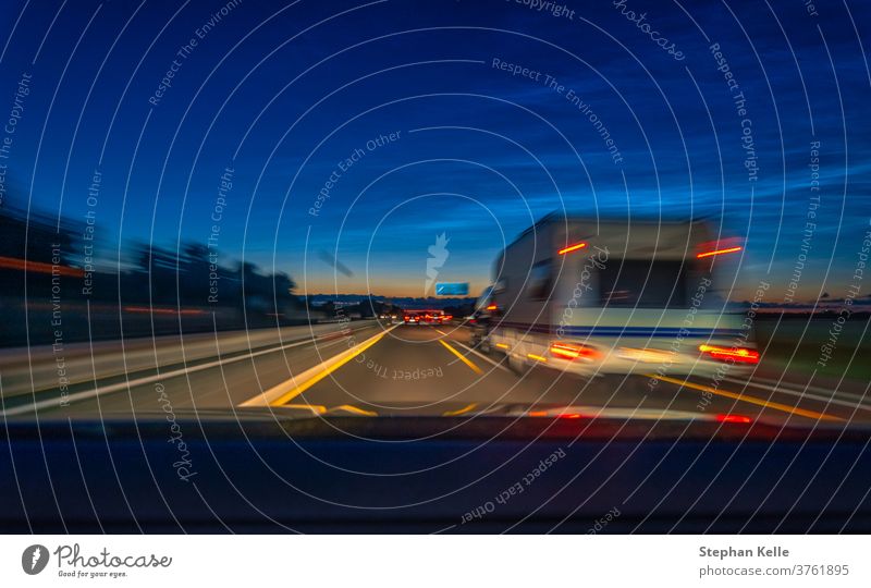 Trailer in motion at a highway at late sunset trailer automobile summer landscape home road transport destination travel caravan trip vacation transportation