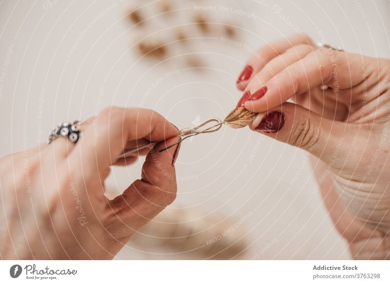 Crop woman creating decoration in workshop handmade craftswoman create maker detail table studio handicraft female artisan process creative skill small business