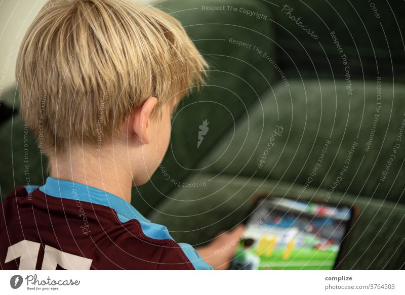 Little boy playing with the tablet computer Tablet computer Ipad Computer gamble Playing gaming Boy (child) Child Screen Screen time upbringing Family at home