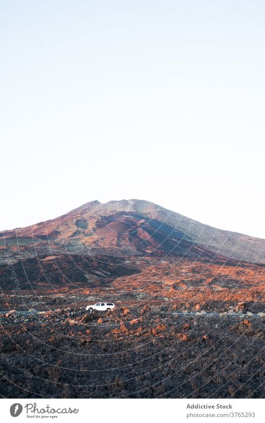 Picturesque view of rocky terrain at sunset valley mountain range dry landscape amazing formation evening tenerife spain canary island cloudless sky peak hill