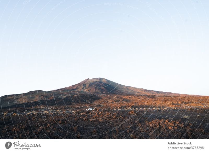 Picturesque view of rocky terrain at sunset valley mountain range dry landscape amazing formation evening tenerife spain canary island cloudless sky peak hill