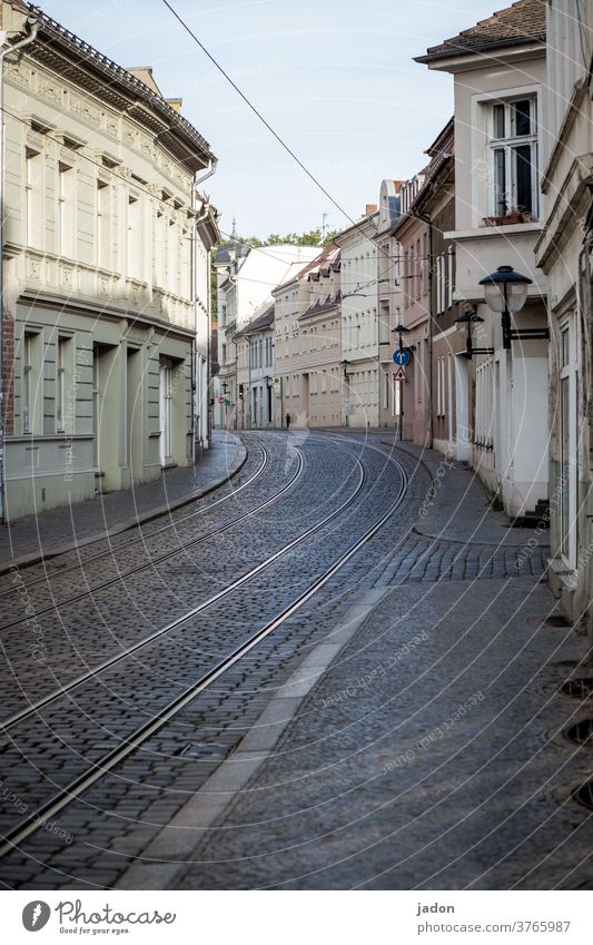 empty streets (29 + guest contribution). Street Light Street lighting Railroad tracks Tram Paving stone Facade Curve Public transit Deserted Rail transport