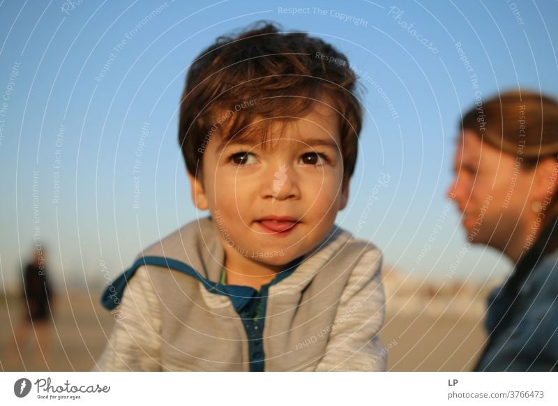 beautiful boy, facing the sun , eyes closed Front view Upper body Portrait photograph Sunbeam Contrast Shadow Light Structures and shapes Pattern Abstract