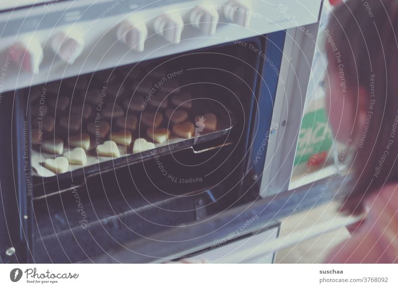 view into the oven with cookies Baking Baking tray Cookie biscuits Christmas cookies Christmas biscuit heart Autumn Winter Christmas & Advent Baked goods cute