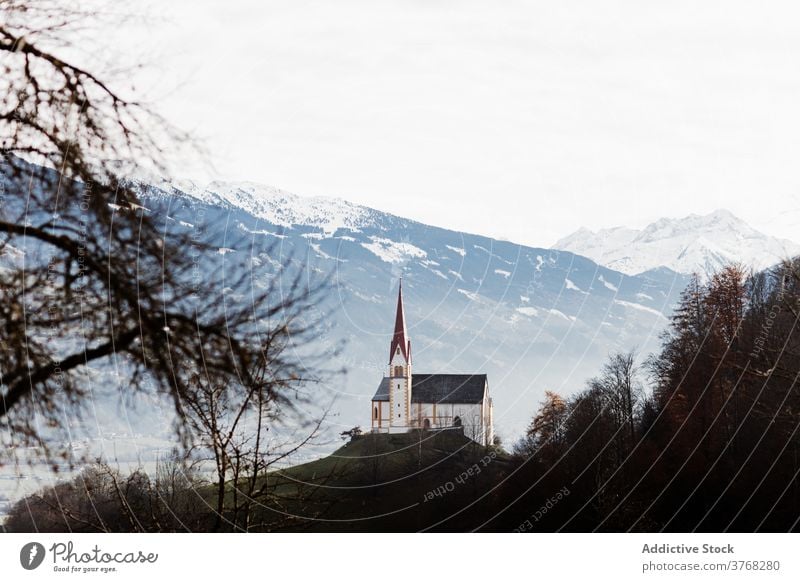 Church on hill in highlands in winter mountain church building landscape amazing snow range germany austria ridge majestic scenic wonderful small cold tranquil