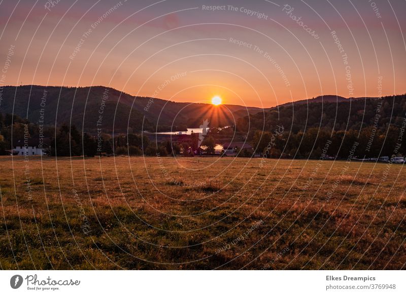 The sun rises over Rurberg am Rursee in the Eifel Sunrise rurberg Lake Rursee Autumn