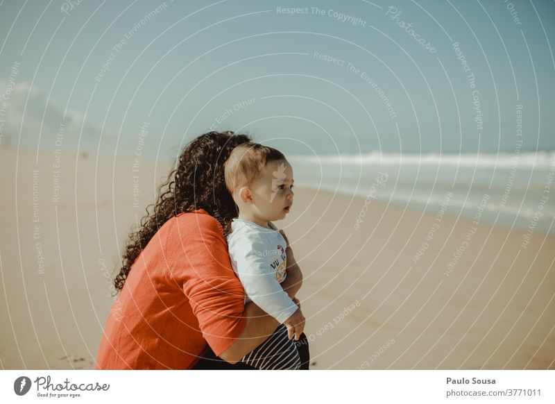 Mother and child watching the sea motherhood Child Son Family & Relations Together togetherness care Joy Smiling Life Happy Adults Parents Love Lifestyle