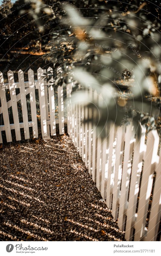 #A# At the fence Fence Fence post lattice fence fence door green Hedge Neighbor neighbourhood neighbourhood dispute Real estate Garden Border