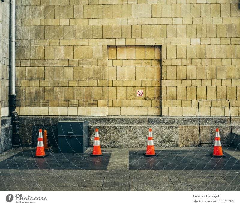 Tiled wall with red traffic cones tiled wall Wall (building) Colour photo Facade Architecture Exterior shot Brick Stone Pattern Old Building