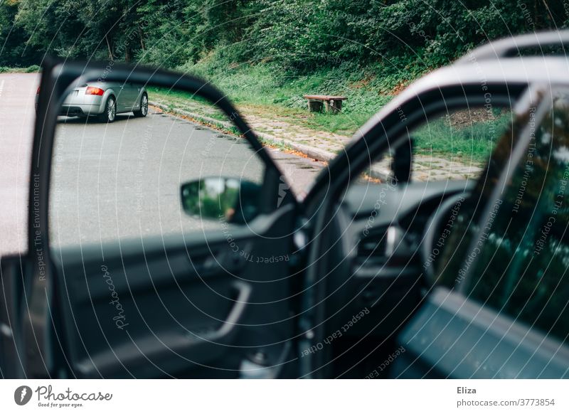 Opened door of a car at a motorway service station Motoring Highway Rest Stop open Car door Break Car journey Vehicle Bench Driver's door driver's side