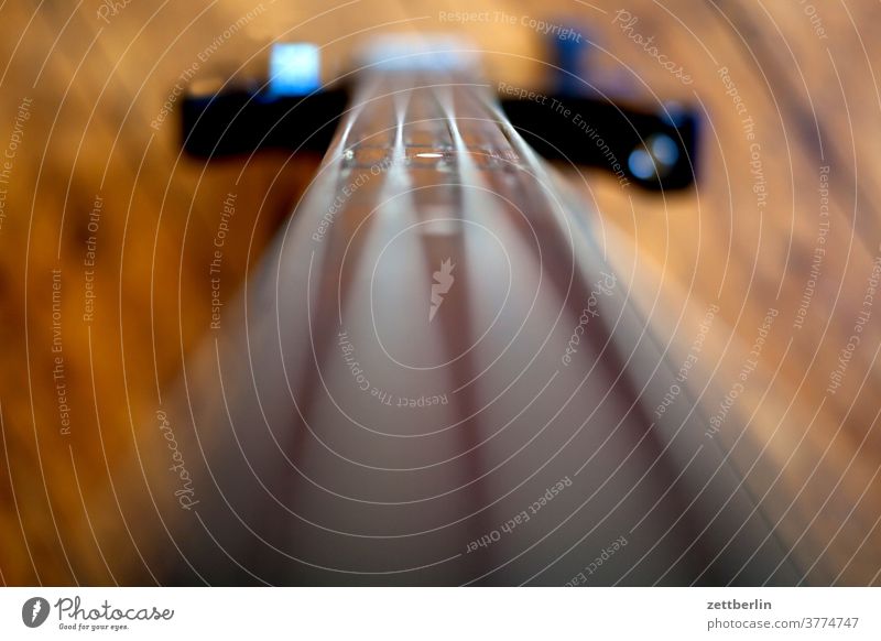 Bird's eye view of the bass blurred Sample Rehearsal room entertainment E-Bass depth of field bassist Band Neck pennant Stand Truss fretless