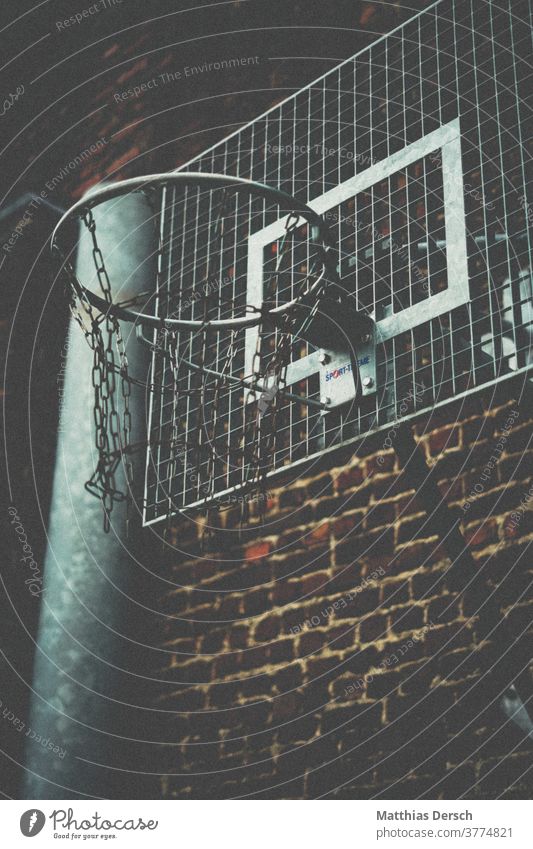 Basketball hoop in industrial area Basketball basket Basketball arena basketball court basketball net basketball ring Brick Brick wall Brick facade Industry