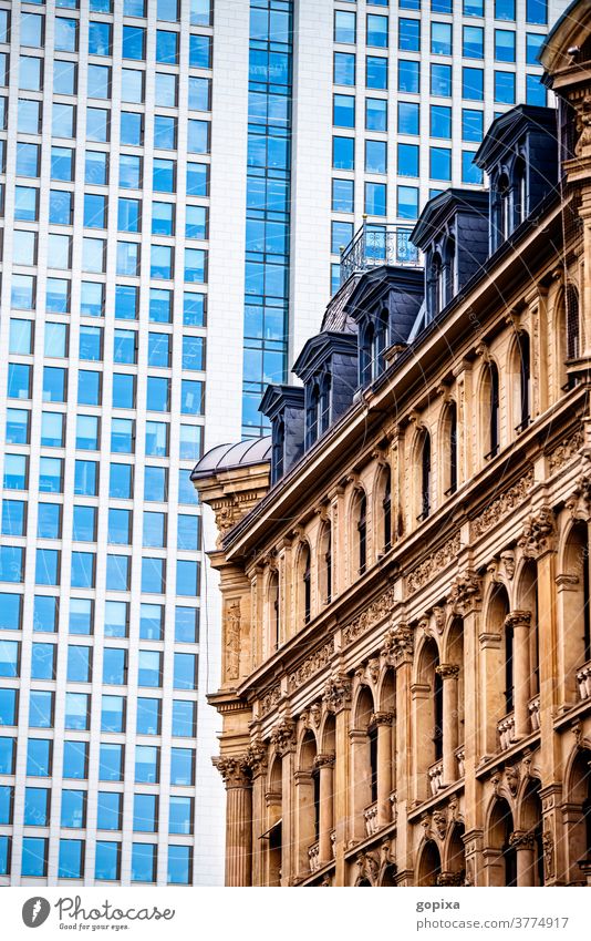 Historical building in Frankfurt am Main with high-rise building in the background High-rise skyscrapers opera tower Modern built real estate Office building