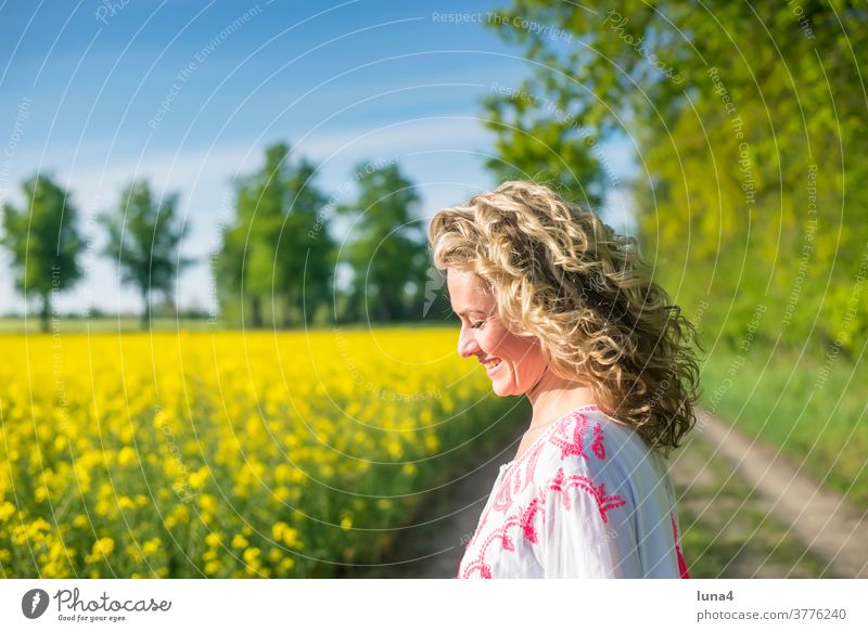 happy young woman in a rape field Woman Happy sensual fortunate daintily Canola Joy Canola field Smiling Laughter pretty Dress Joie de vivre (Vitality)