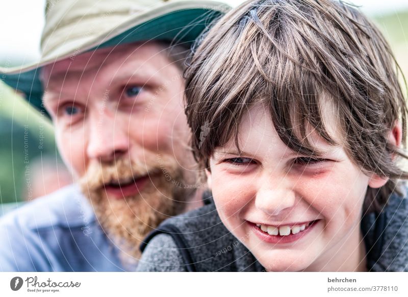 love.live.laugh Smiling Affection proximity Cuddling portrait Light Day Love Son Colour photo Warm-heartedness Together Safety (feeling of) Trust Facial hair